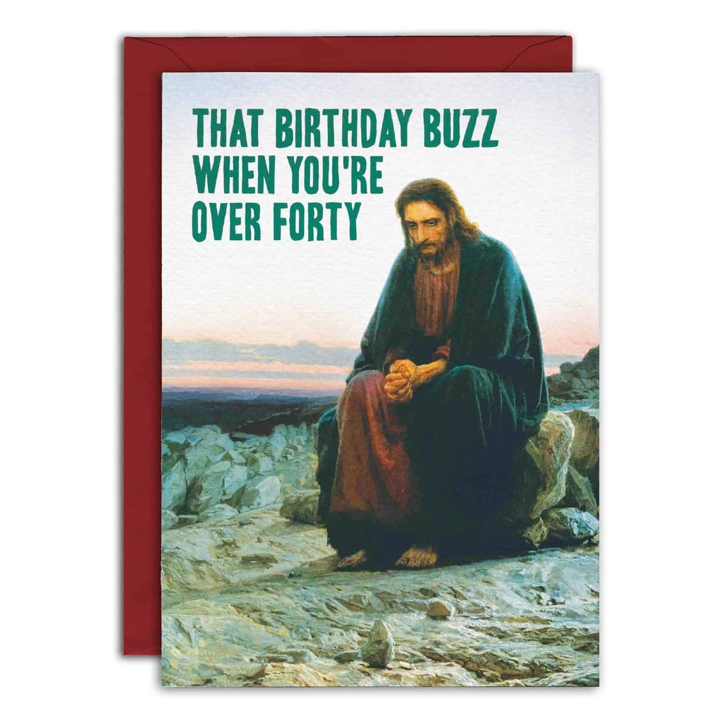 Card with a religious figure sitting on a mountain, text 'That Birthday Buzz When You're Over Forty', red border