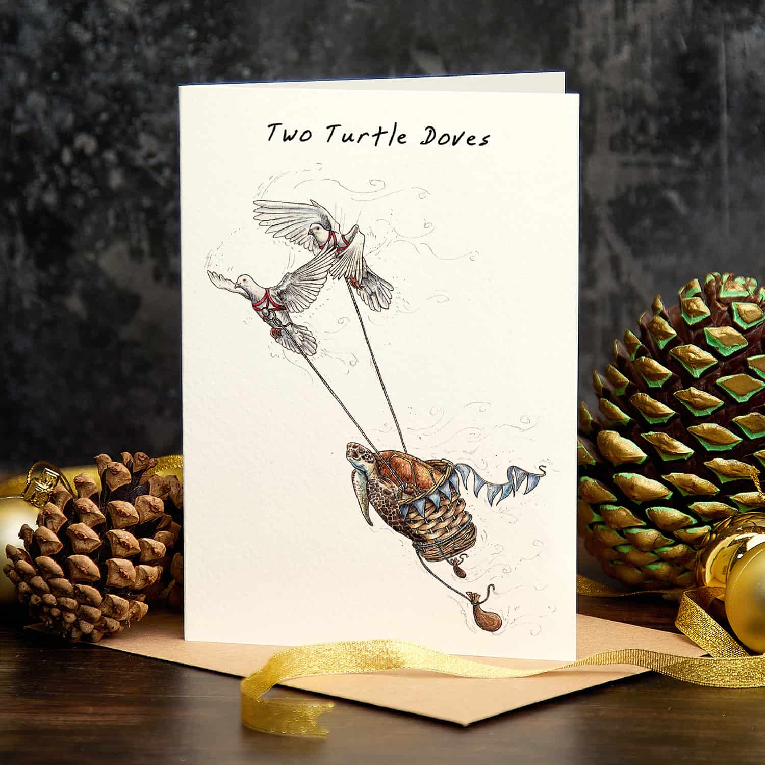 Greeting card with illustration of two turtle doves and pinecones on a dark background
