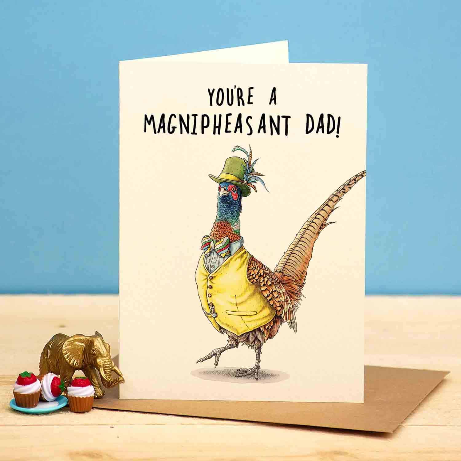 Card with a decorative pheasant illustration and humorous text on a blue background