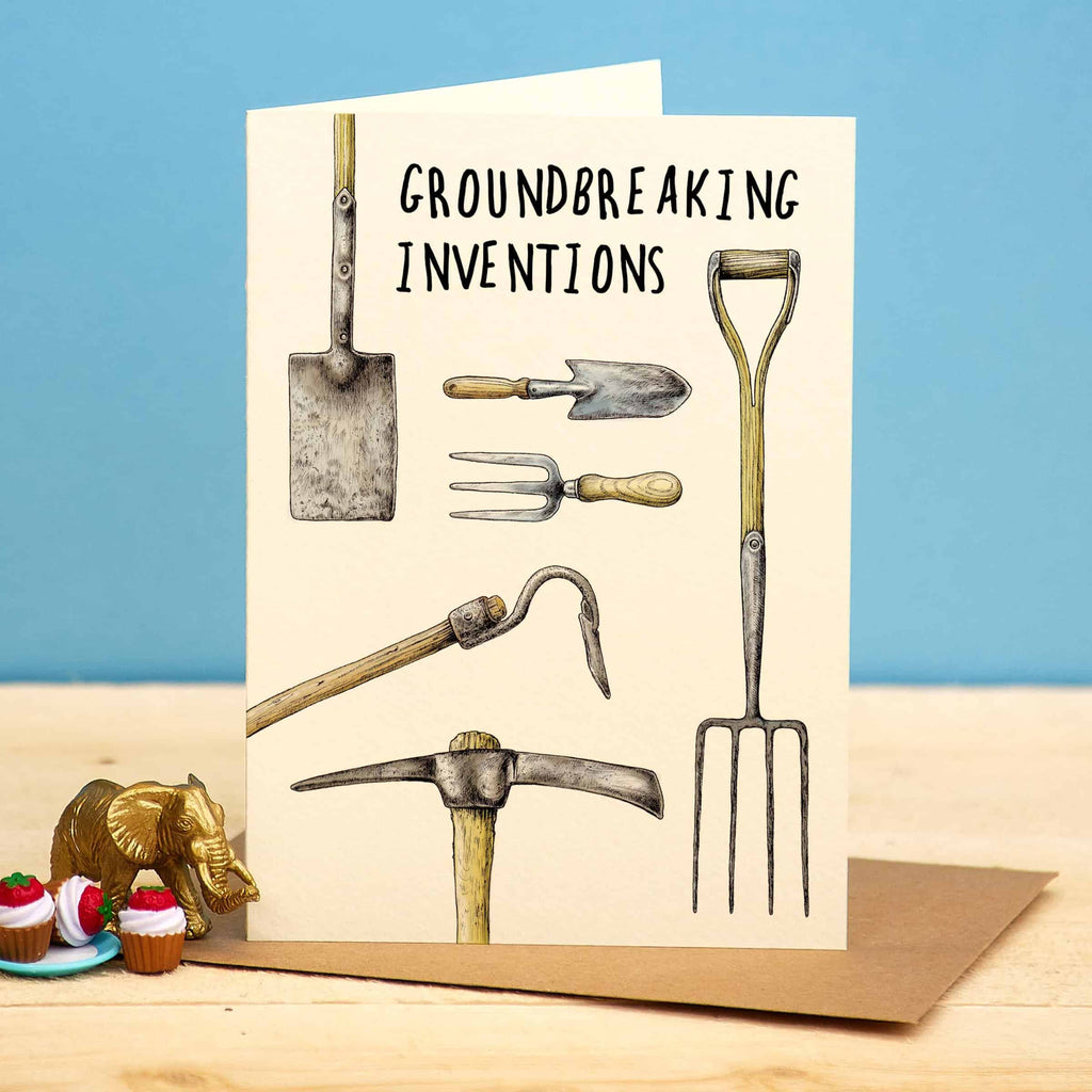 Card with gardening tools illustration and 'Groundbreaking Inventions' text on a blue background