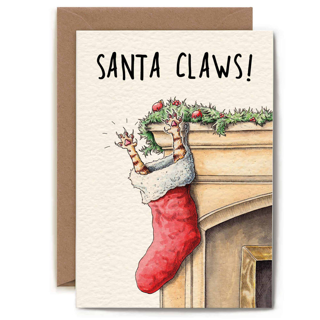 Christmas card with a red stocking and 'Santa Claws!' text on a fireplace background