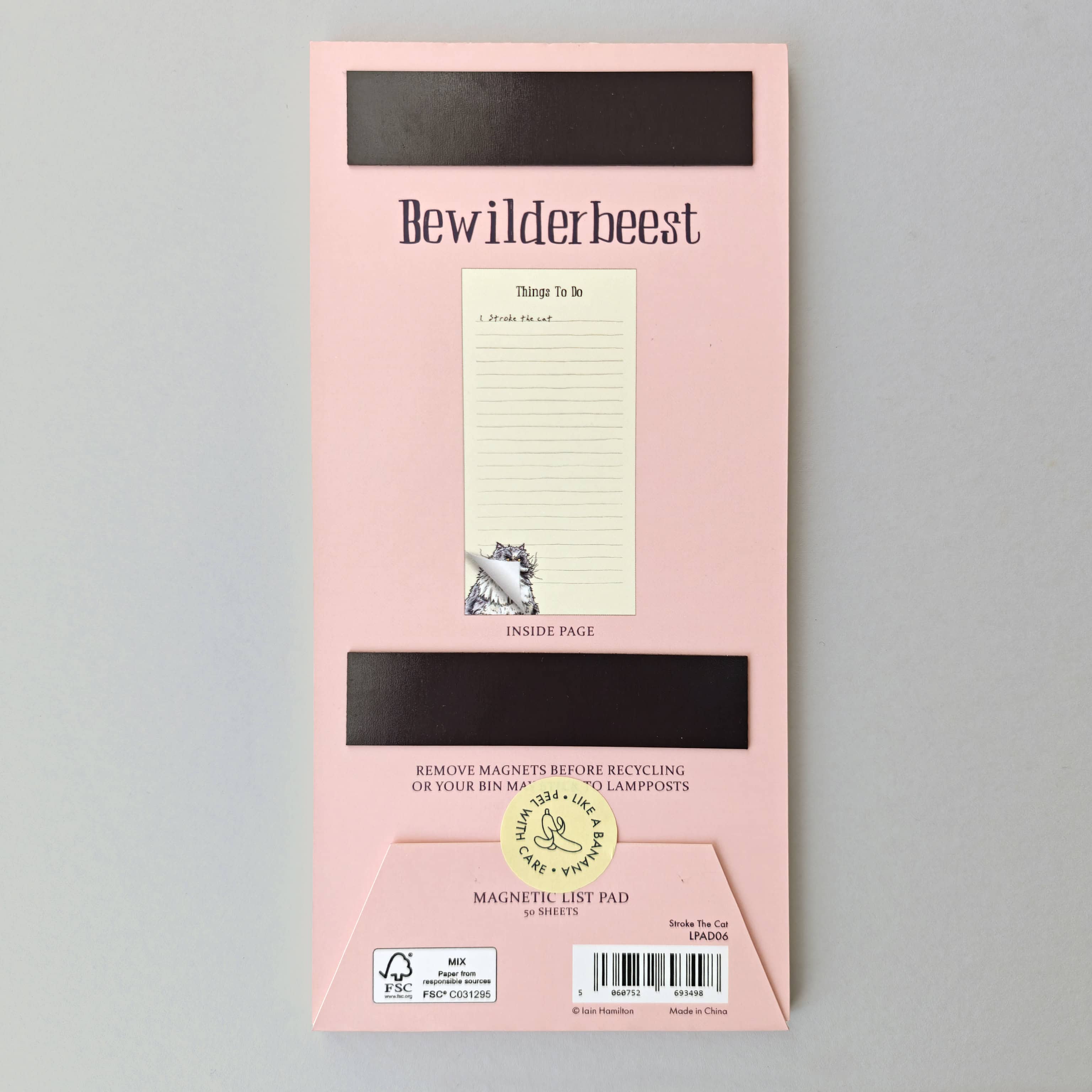 Pink magnetic list pad with 'Bewilderbeest' branding on a gray background