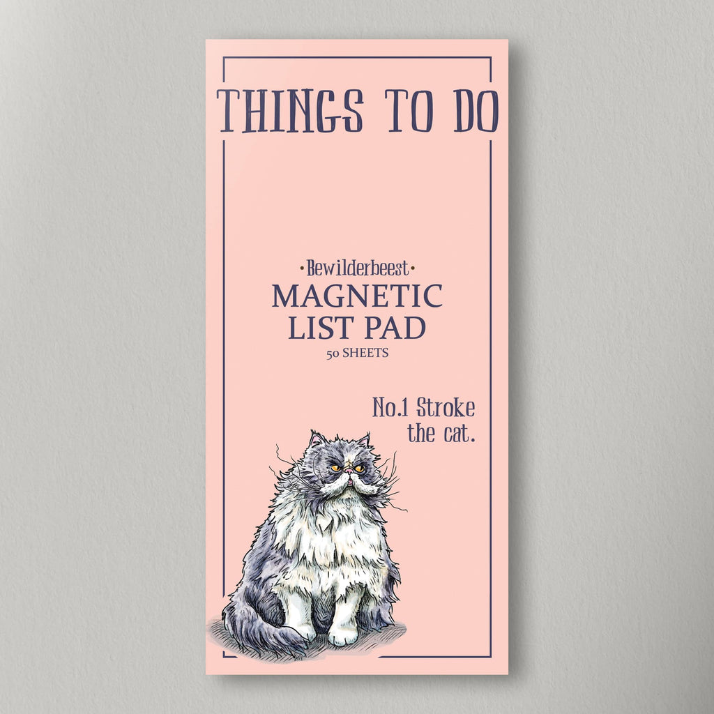 Magnetic list pad with a cat illustration on a pink background