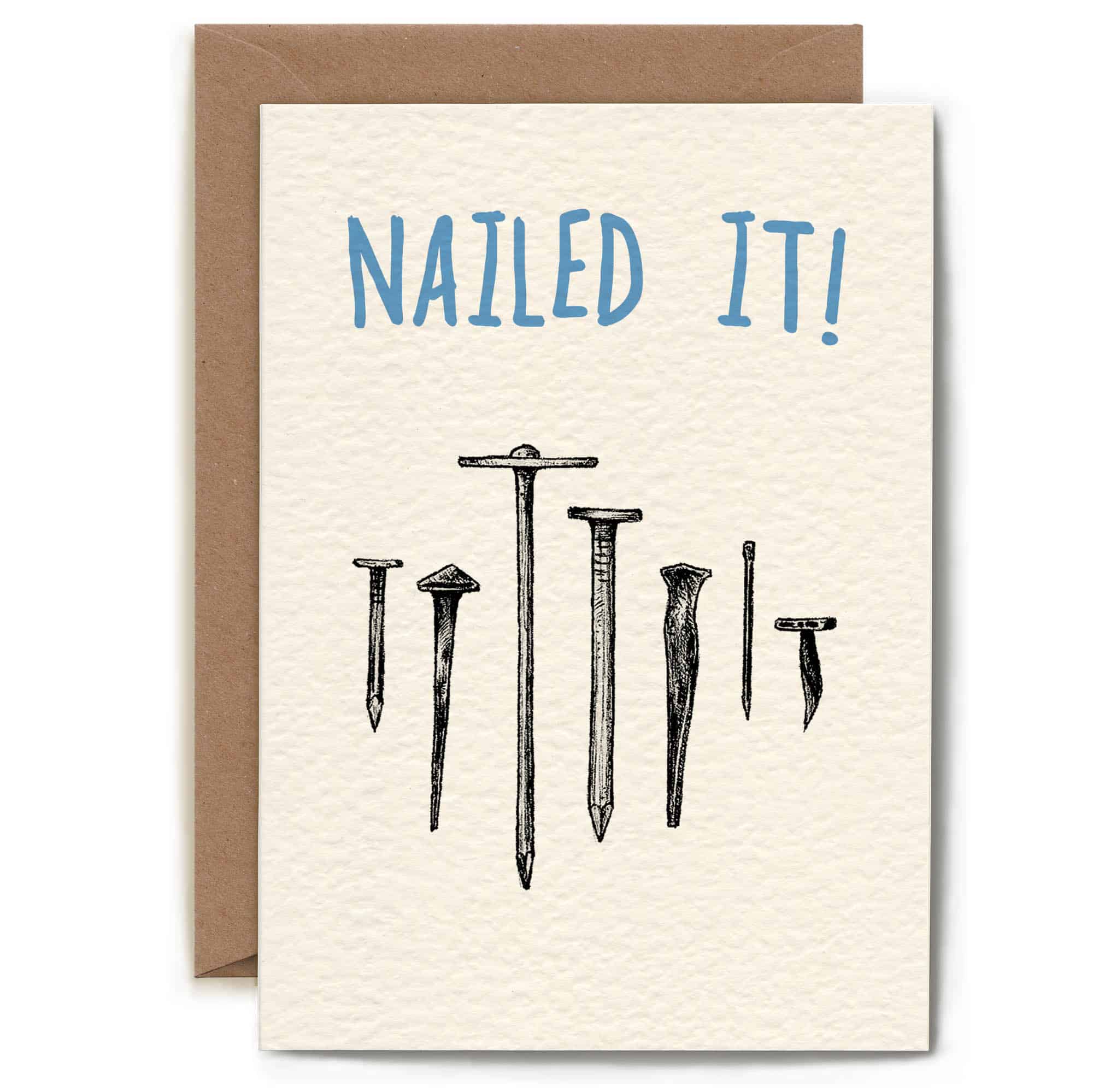 Greeting card with nails and 'NAILED IT!' text on a white background