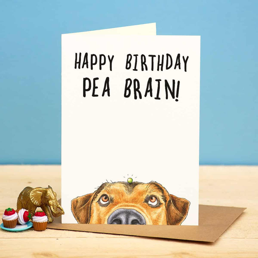 Birthday card with dog illustration and 'Happy Birthday Pea Brain!' text