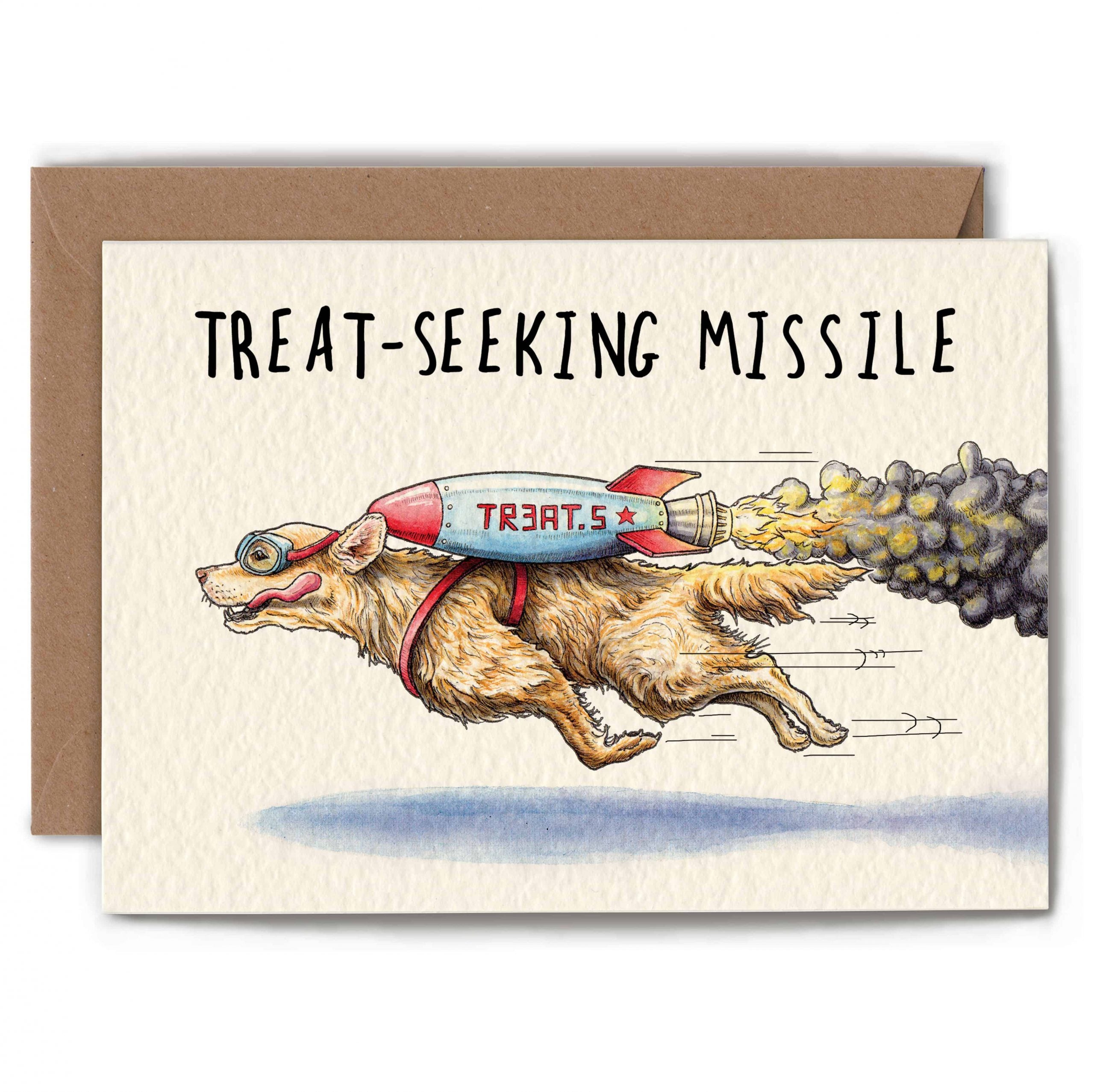 Card with a dog labeled 'Treat-Seeking Missile' and a rocket on a beige background