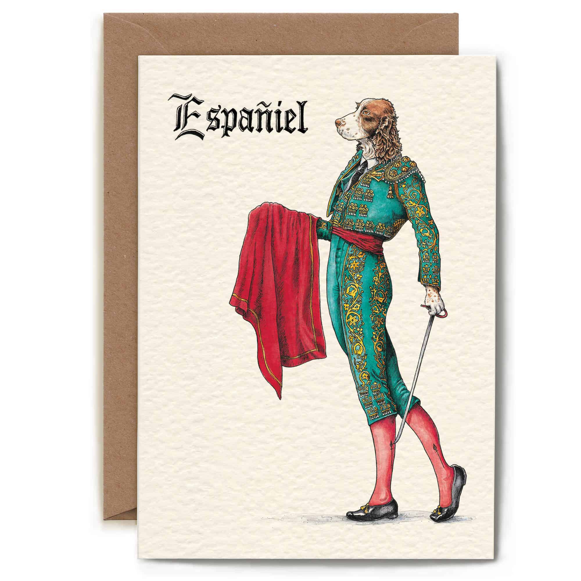 Greeting card with a dog in a costume labeled 'Espaniel' on a beige background.