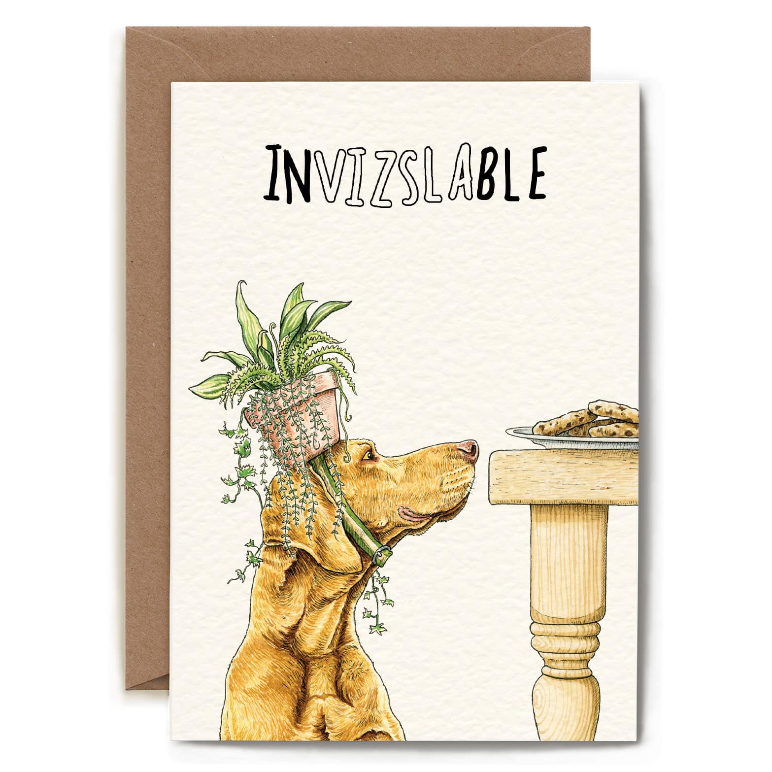 Card with a dog holding a plant and the word 'INVIZSLABLE' above it, with a brown envelope.