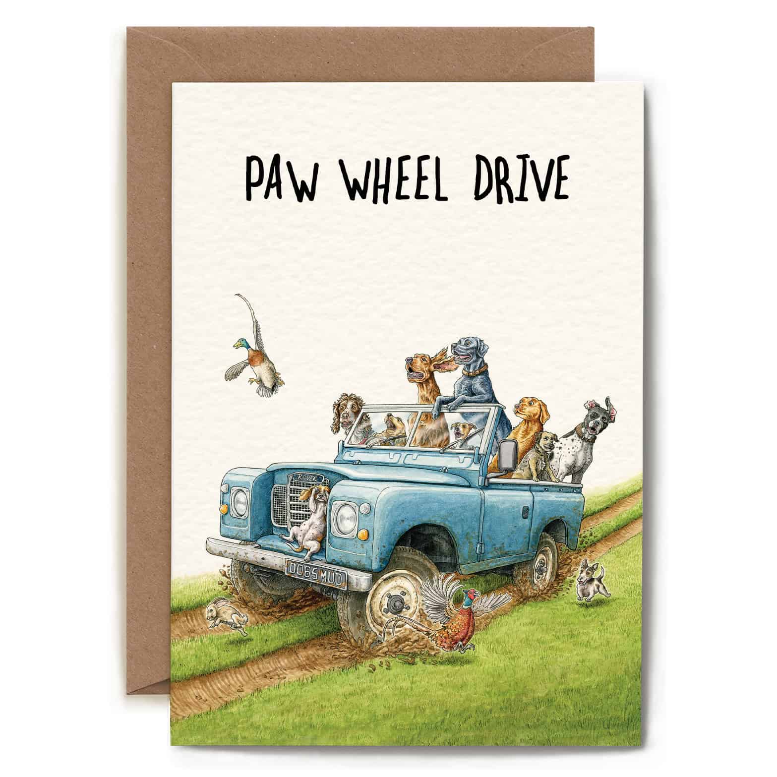 Greeting card with illustration of a car with dogs and 'Paw Wheel Drive' text