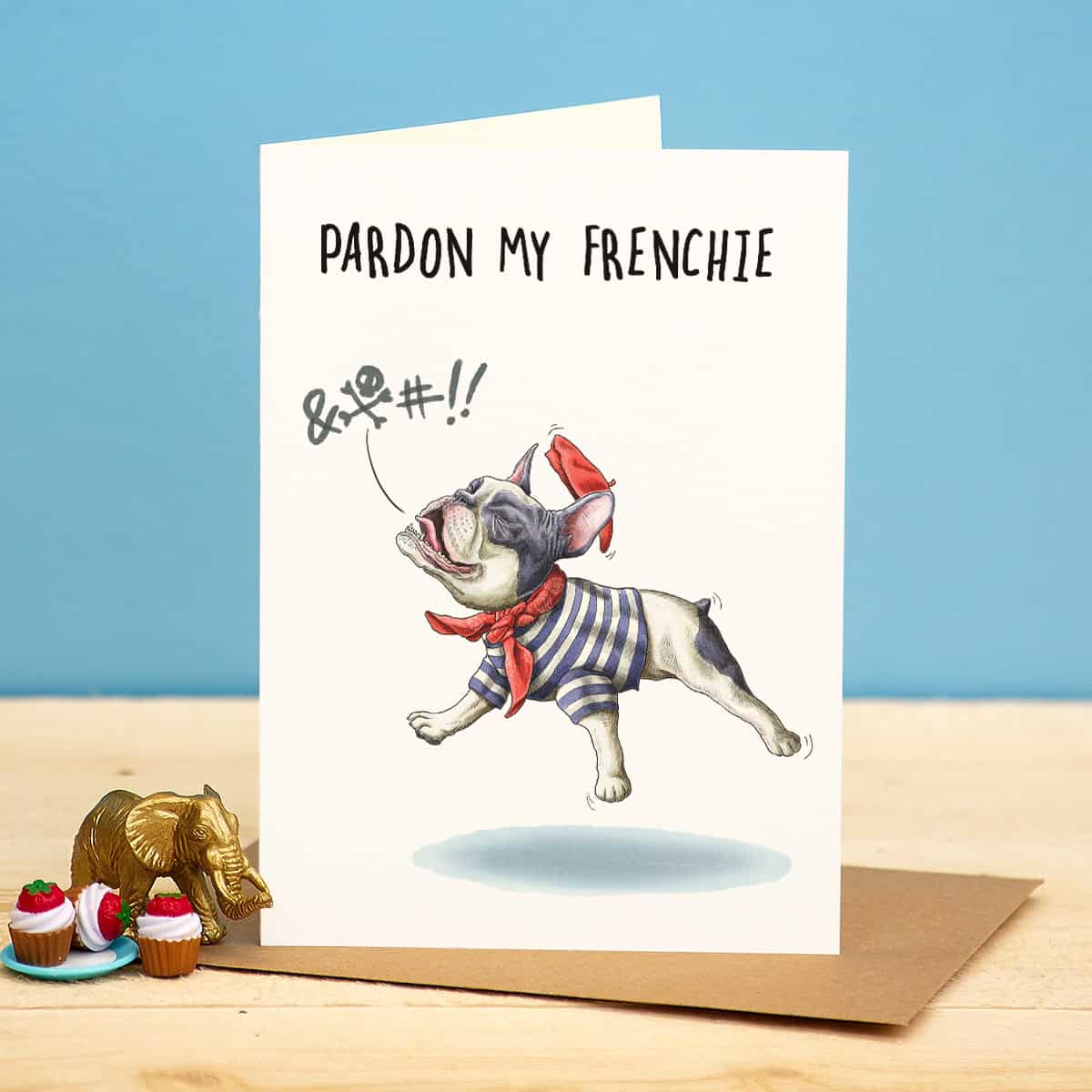 Greeting card with a dog illustration and text 'Pardon my Frenchie' on a blue background