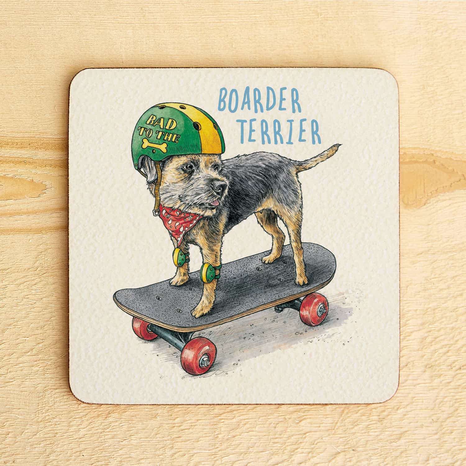 Coaster with a Border Terrier dog illustration wearing a helmet and bandana, standing on a skateboard.