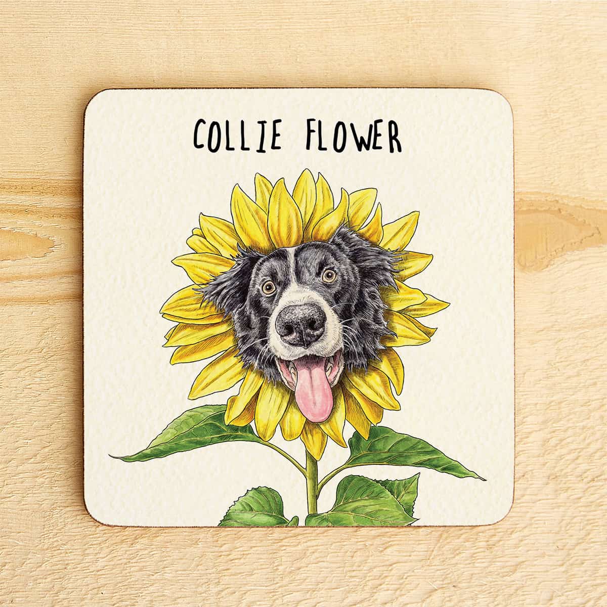 Coaster with a design of a Collie dog face surrounded by sunflower petals on a wooden surface.