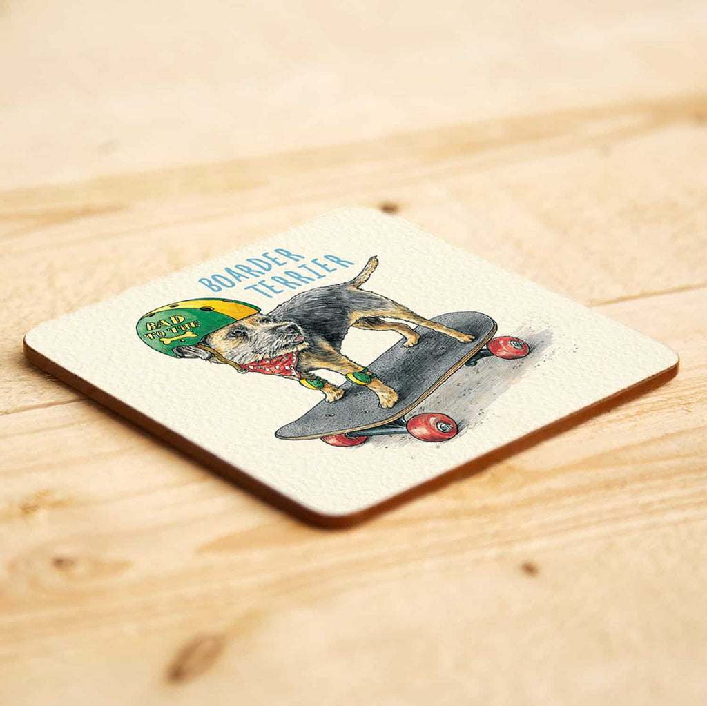 Coaster with a Border Terrier dog on a skateboard illustration wearing a helmet and goggles on a wooden surface