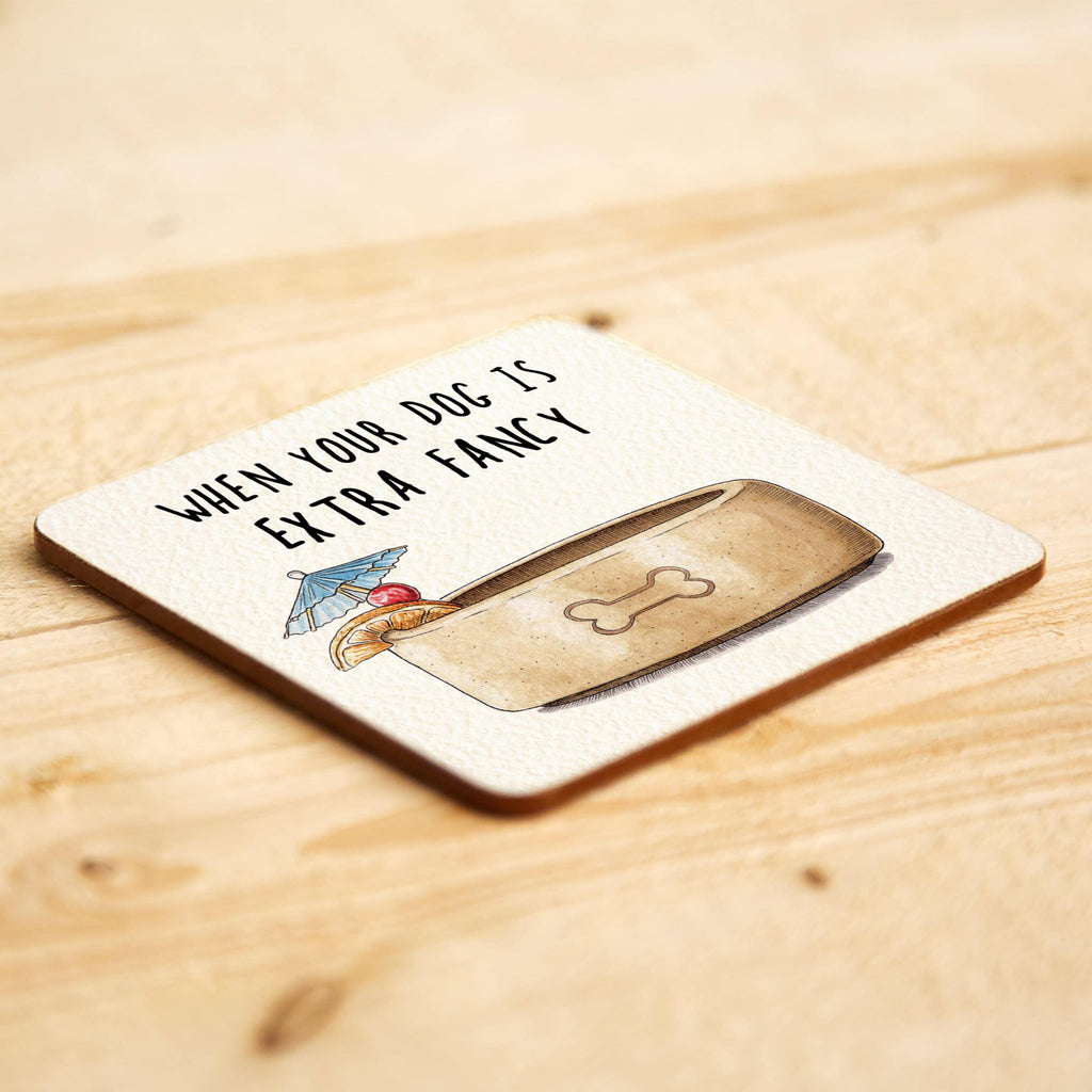 Coaster with a dog-themed design and text on a wooden surface