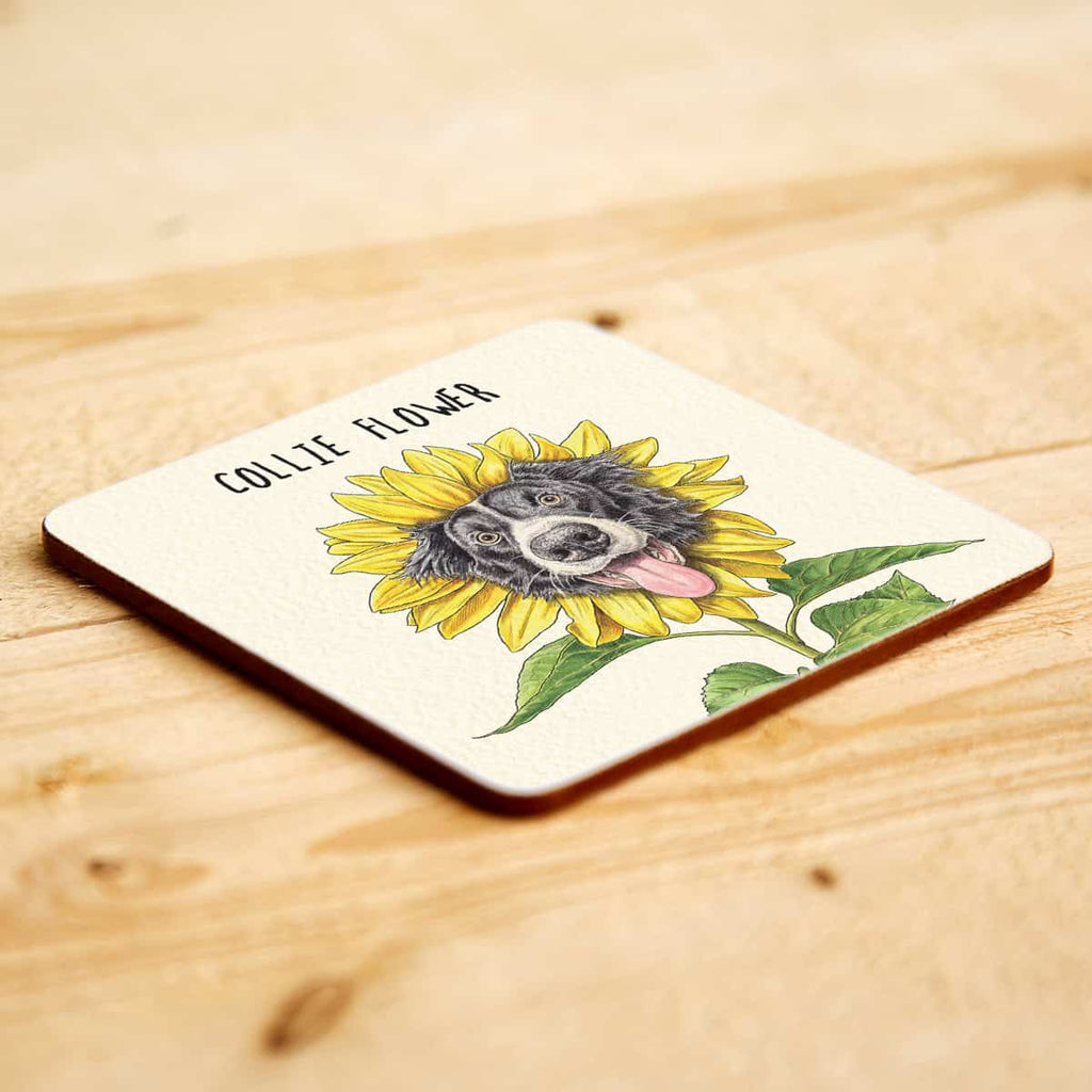 Coaster with a Collie dog illustration and sunflower on a wooden surface