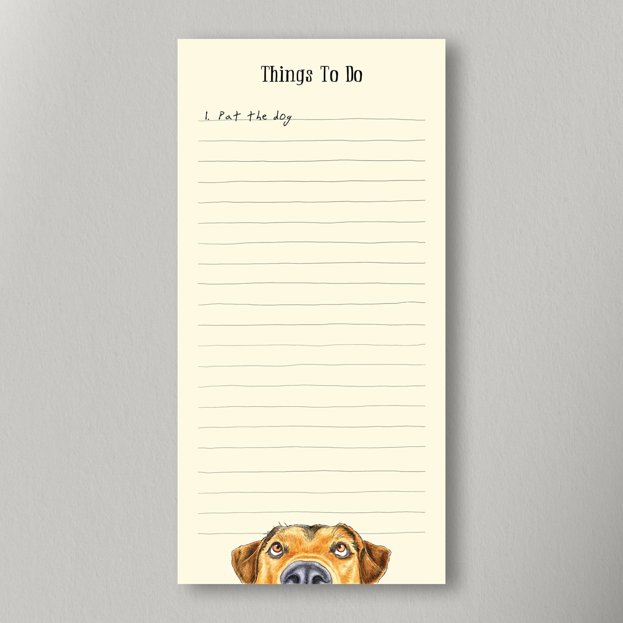Notepad with a dog illustration on a gray background