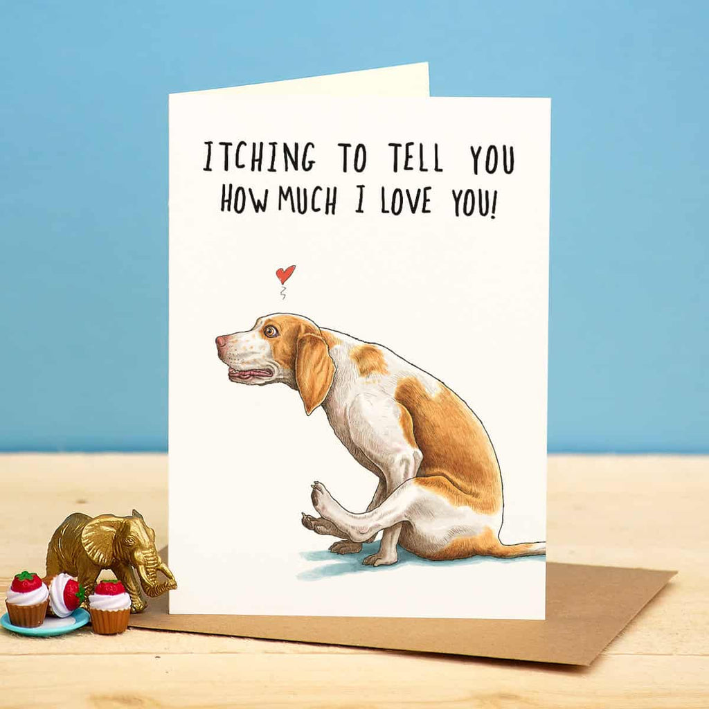 Card with a dog illustration and text 'Itching to tell you how much I love you!' on a blue background.