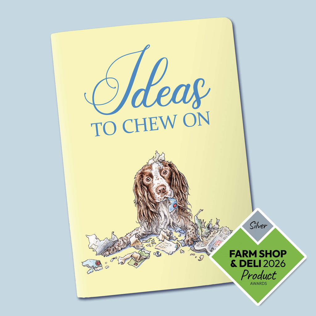 Notebook with a dog illustration and 'Ideas to Chew On' text on a light blue background