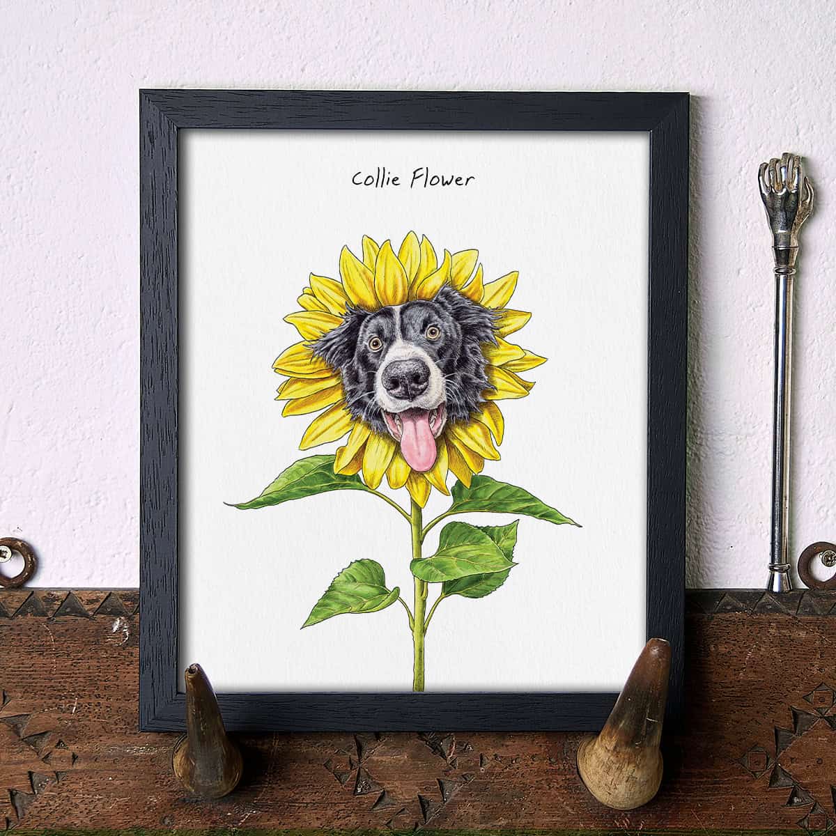 Artwork of a Collie dog's face within a sunflower design on a white background.