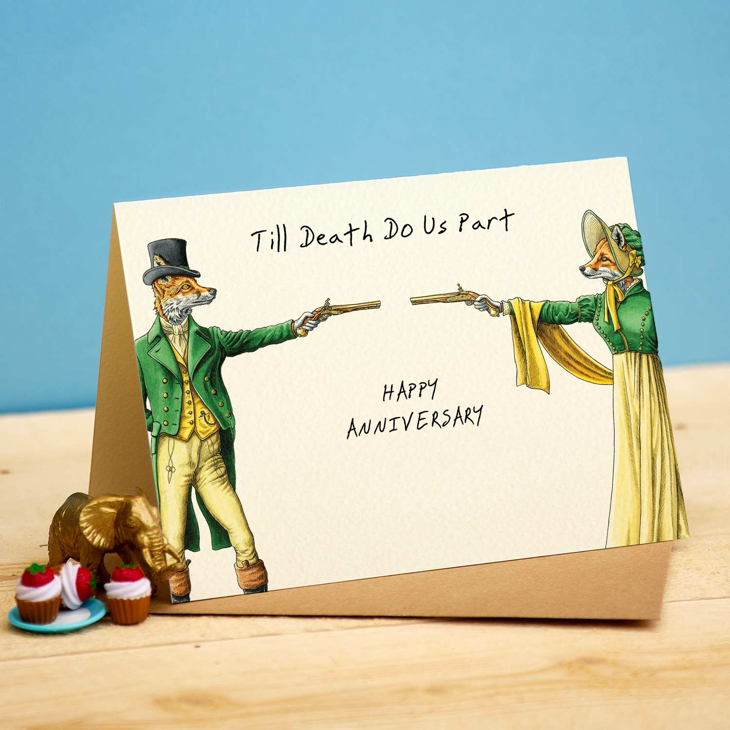 Card with fox and duck characters holding guns, text 'Till Death Do Us Part' and 'Happy Anniversary'' against a blue background.