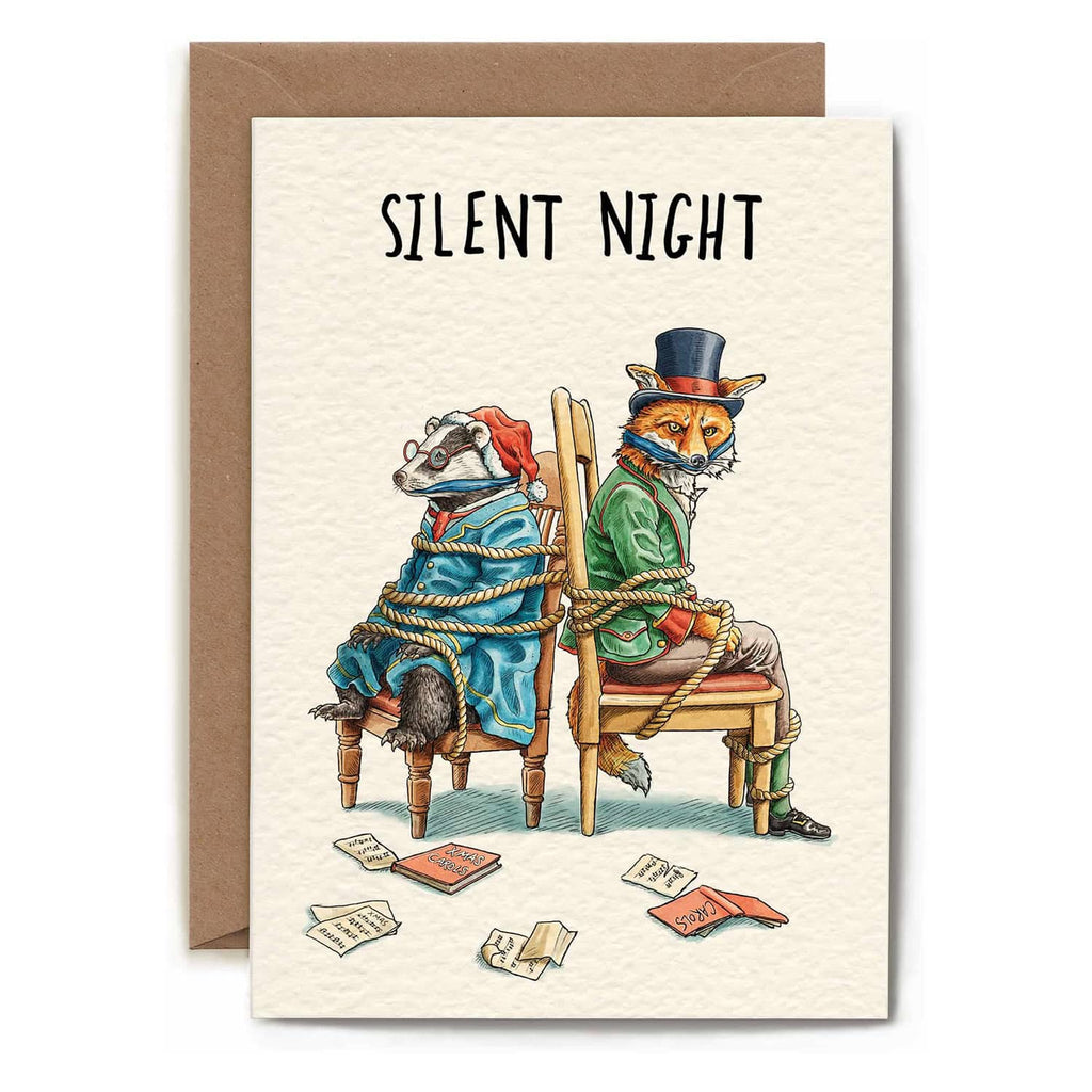 Greeting card with illustration of a fox and badger in costumes on chairs, with 'Silent Night' text.