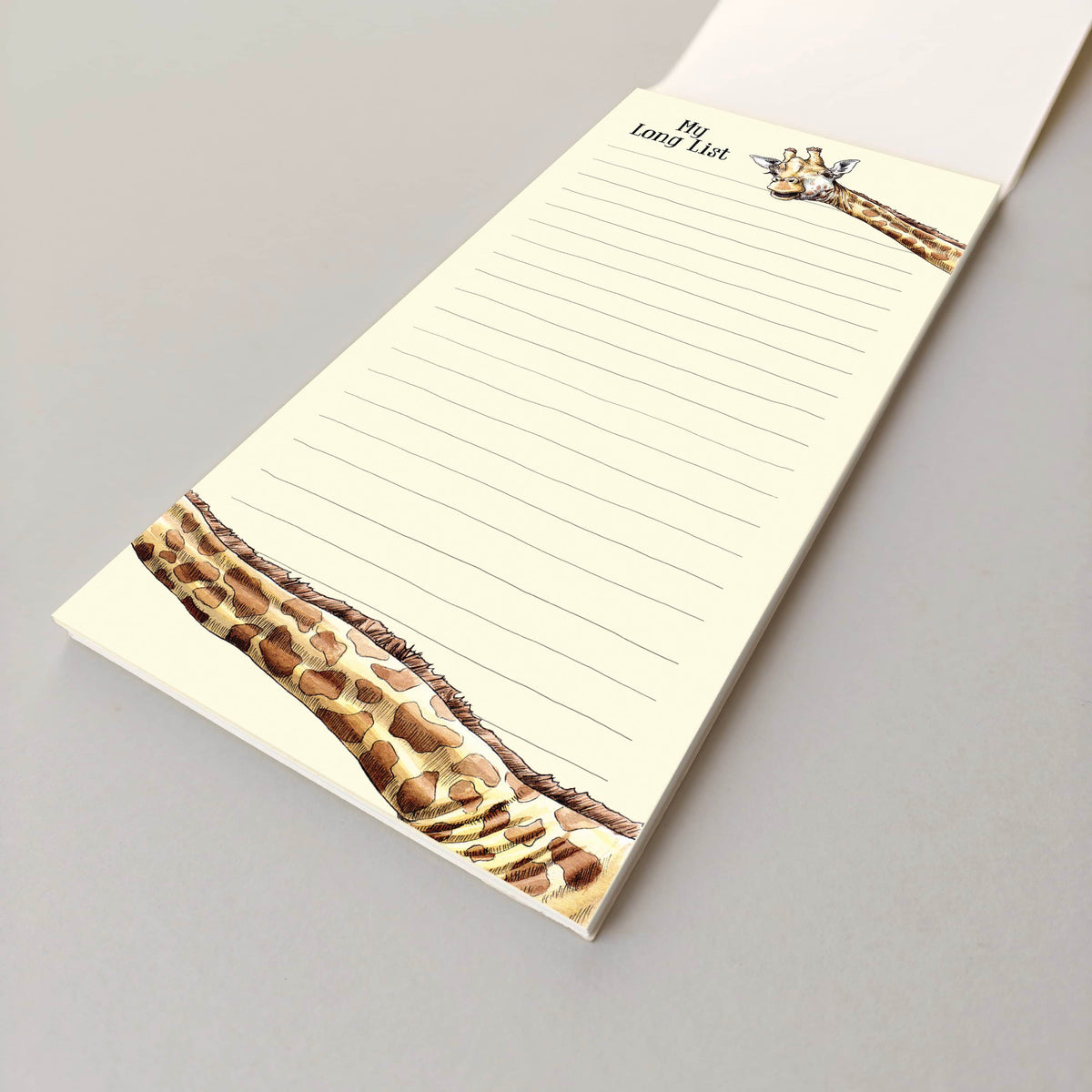 Notepad with giraffe design on a gray background