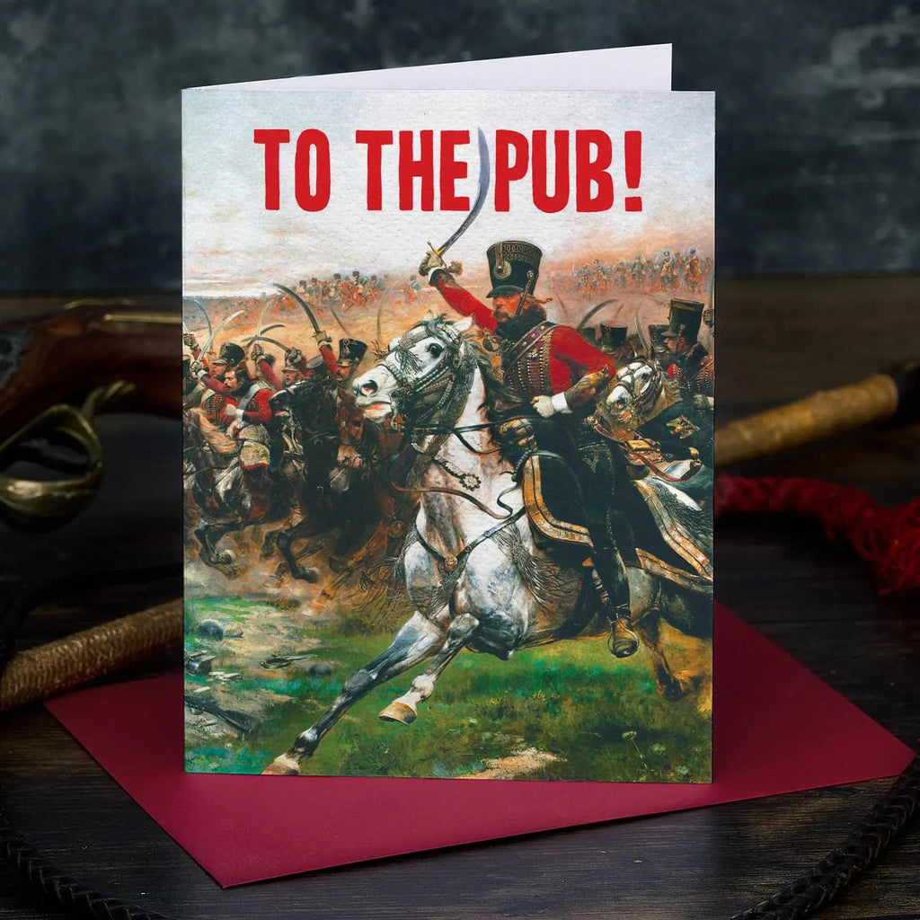 Greeting card with historical scene of a man on horseback and text 'To the Pub!' on a dark background.