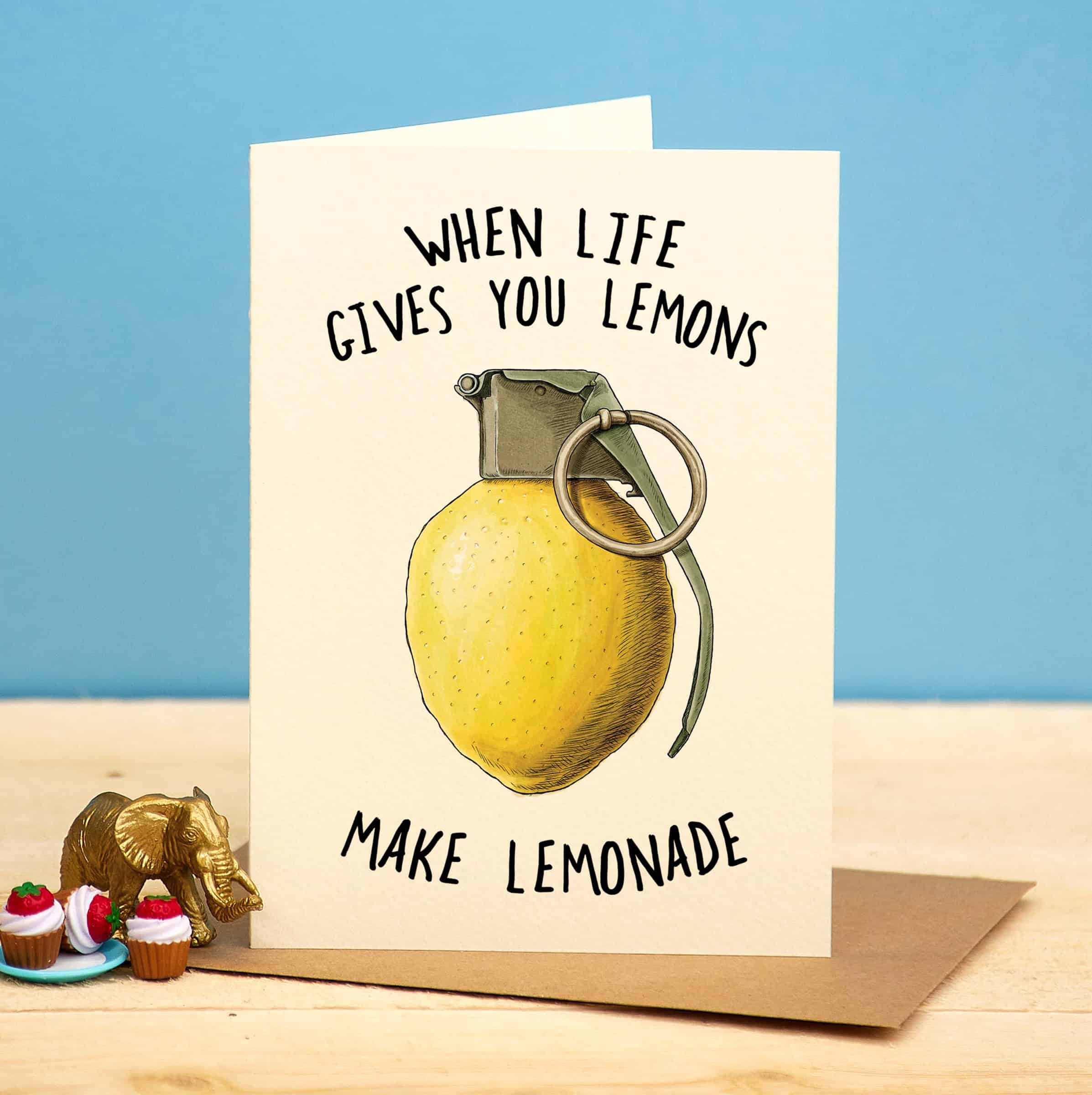 Card with a lemon-shaped grenade illustration and humorous text on a blue background