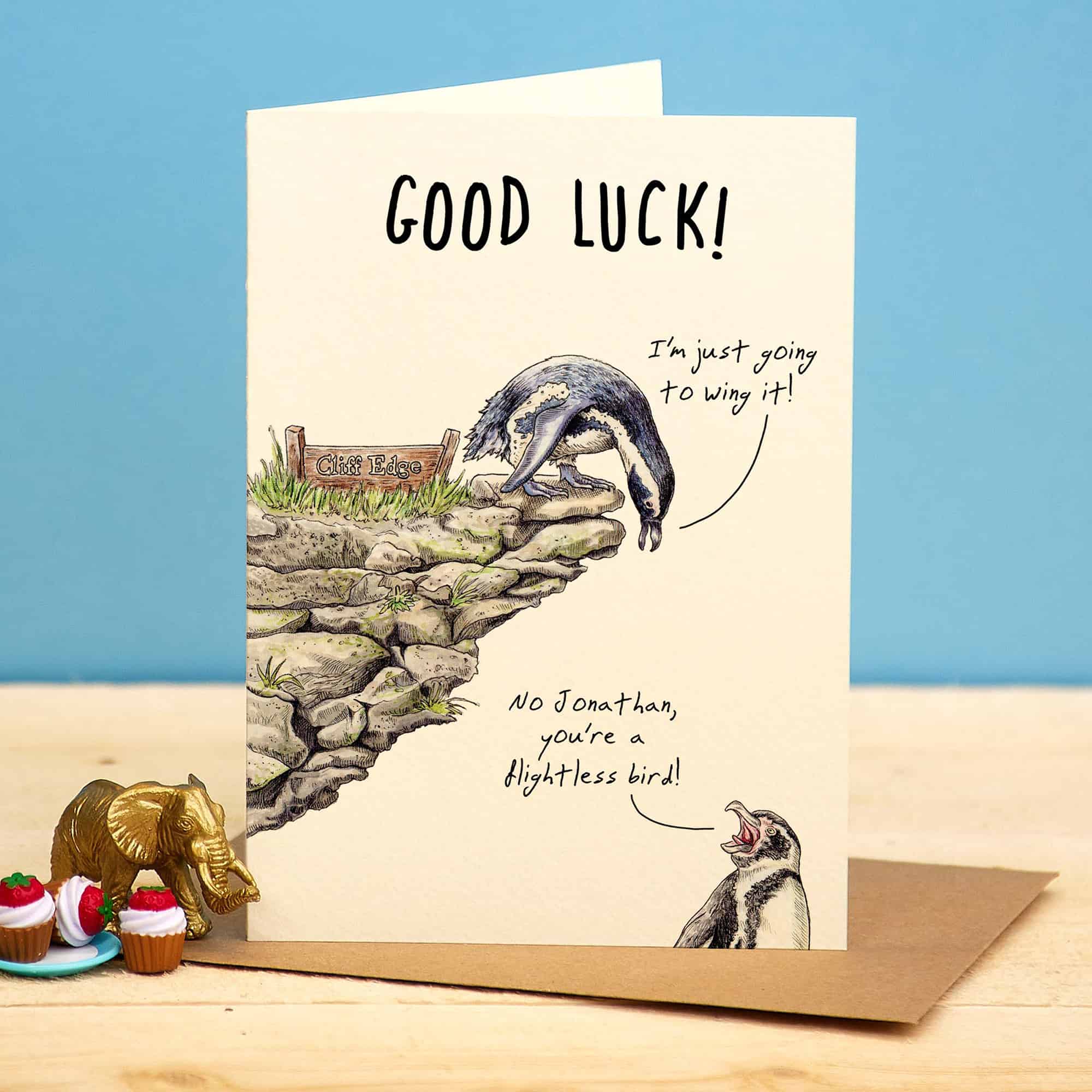 Greeting card with animal illustration and 'Good Luck!' text on a blue background
