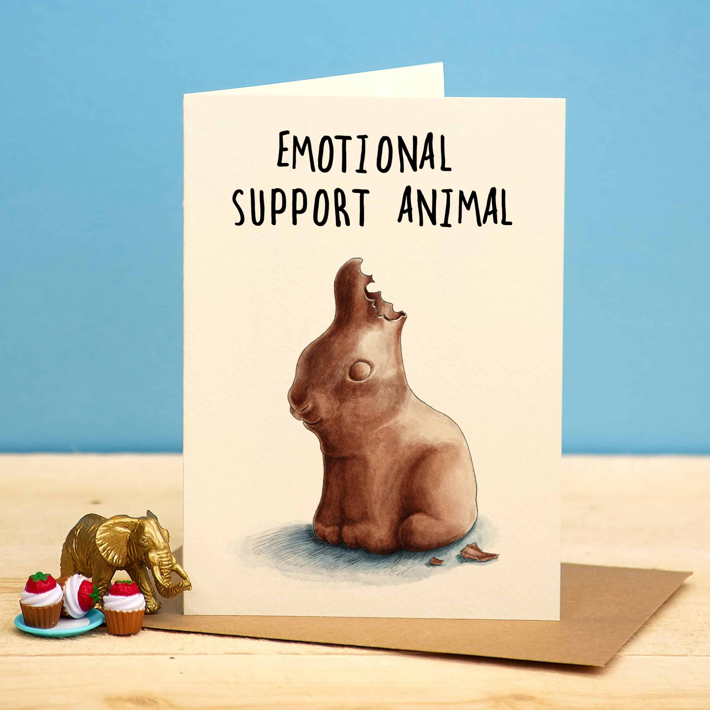 Card with chocolate bunny illustration and 'Emotional Support Animal' text on a blue background