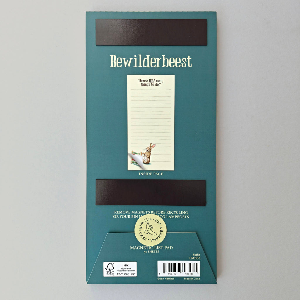 Green packaging of Bewilderbeest magnetic list pad on a gray background