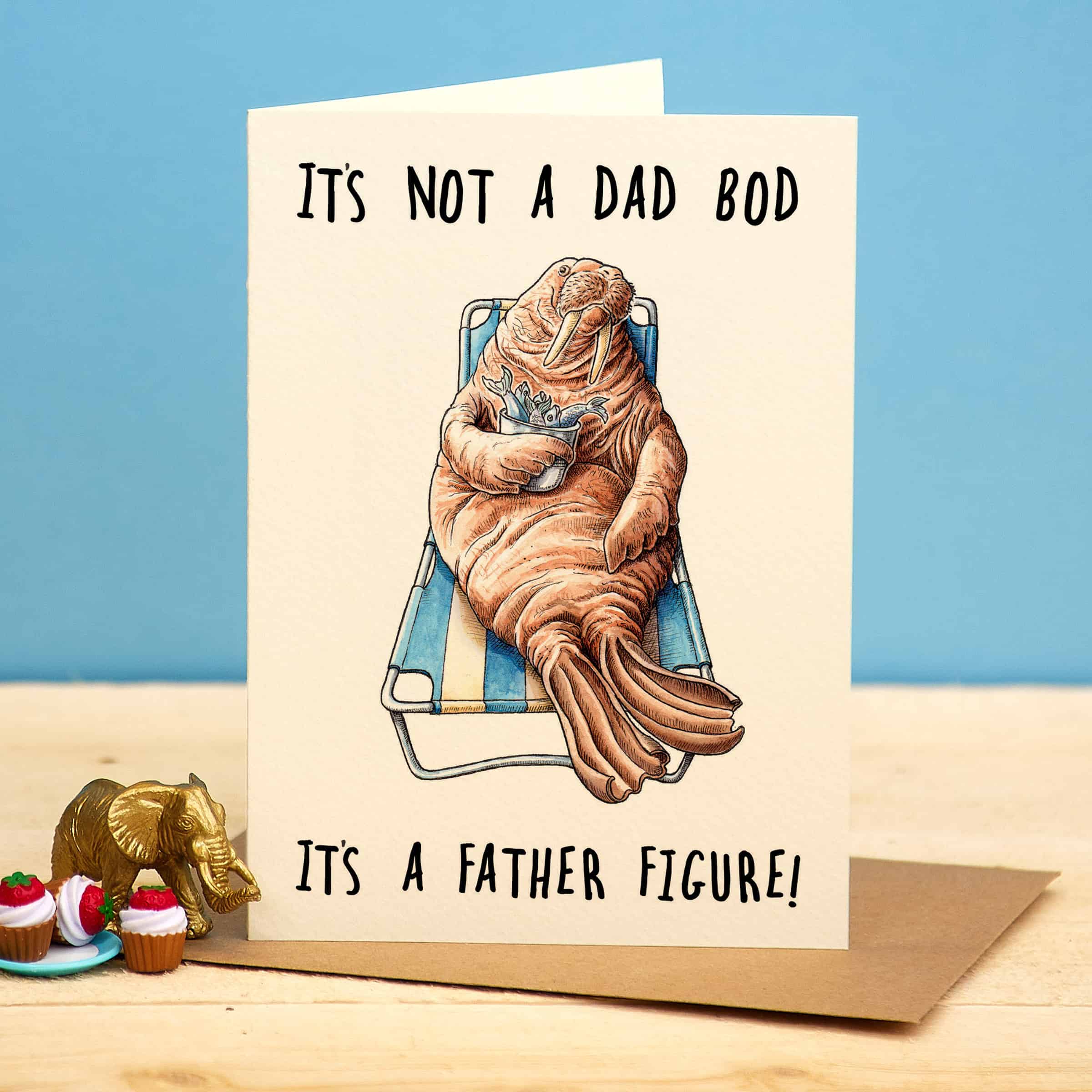Card with a walrus illustration and humorous text on a blue background