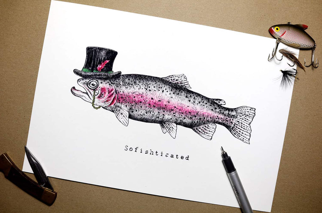 Print of a fish wearing a top hat with a monocle on white paper on a brown background