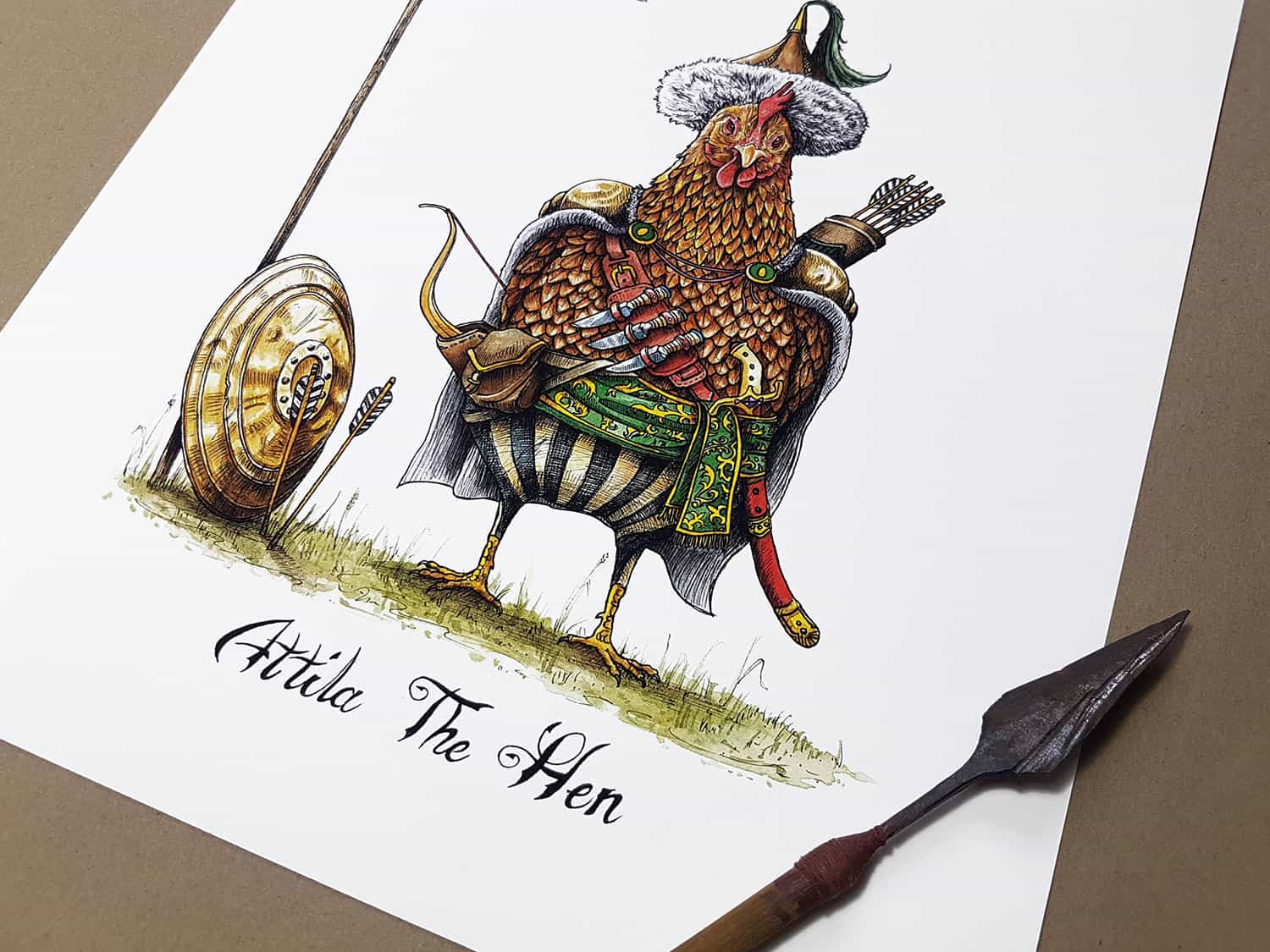 Print of a chicken dressed in a nomadic tribal outfit with a shield and bow and arrows above text reading "Attila The Hen"