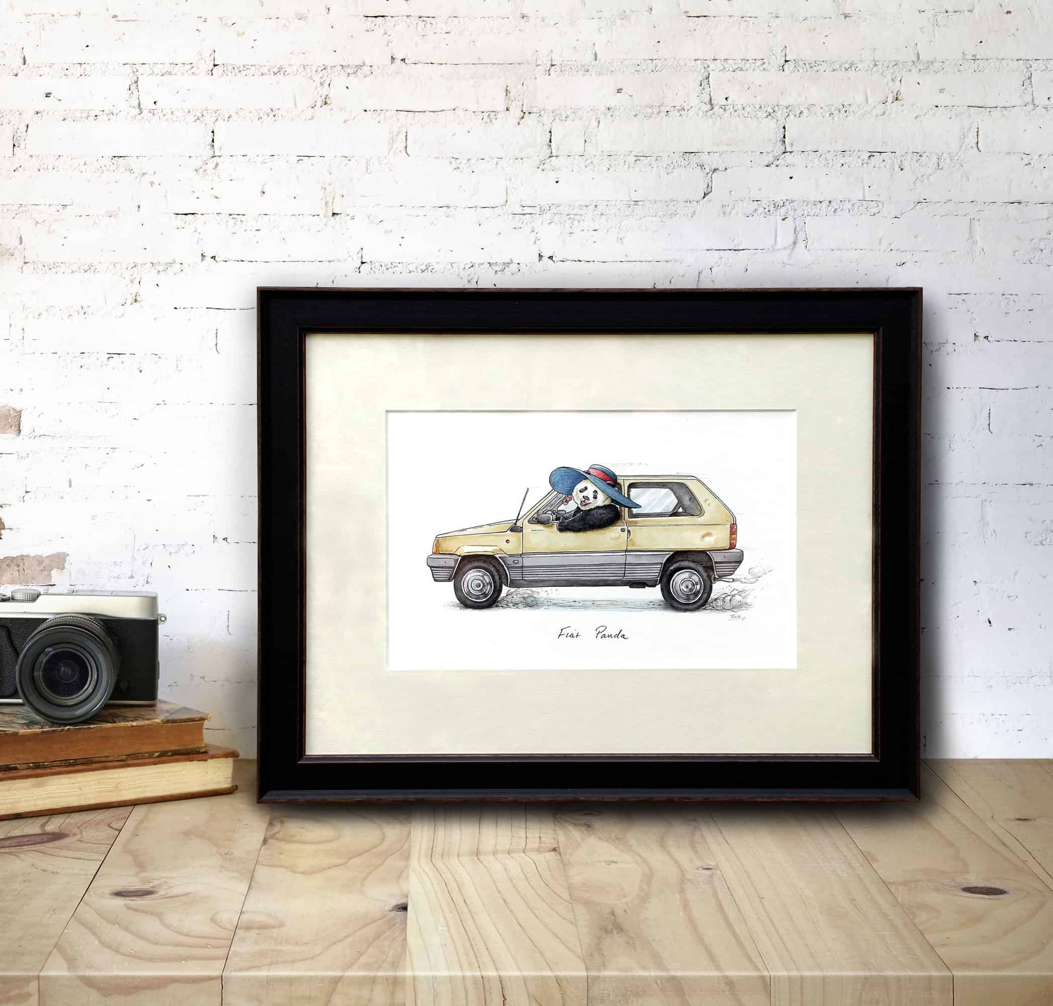 An original illustration of an old yellow fiat panda car being driven by a panda wearing a sunhat in a black frame on a desk
