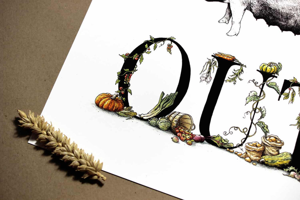 Print of detailed black lettering with vegetables growing around the letters on a white background