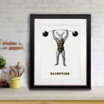 Print of an aardvark dressed as strong man wearing a leotard and lifting a barbell in a black frame sitting on a shelf